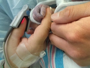 Ethan, baby with anencephaly, with his parents